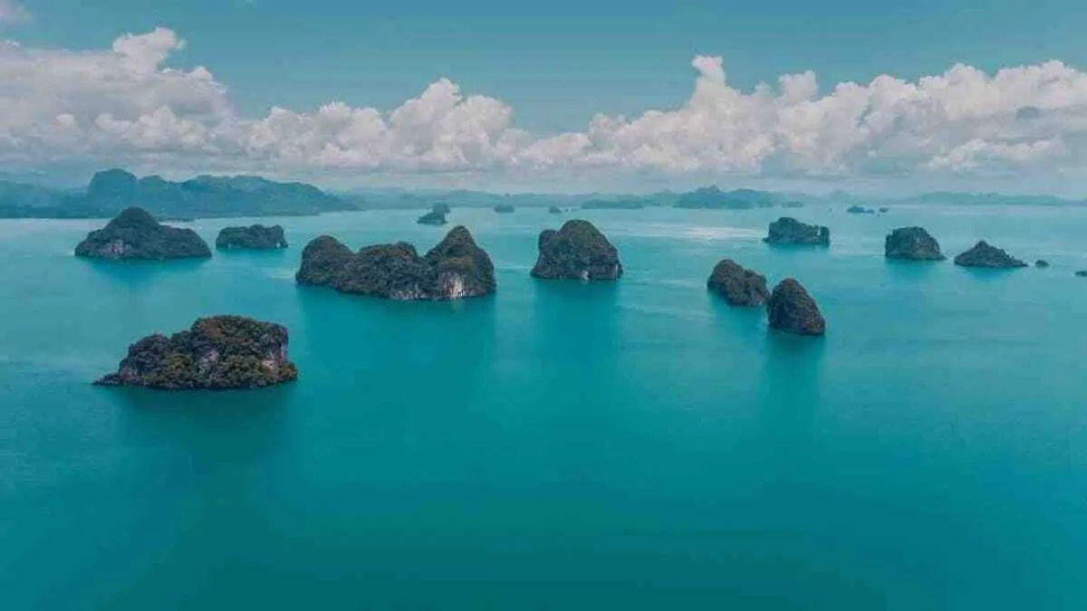 How can a US citizen buy a house in Thailand?